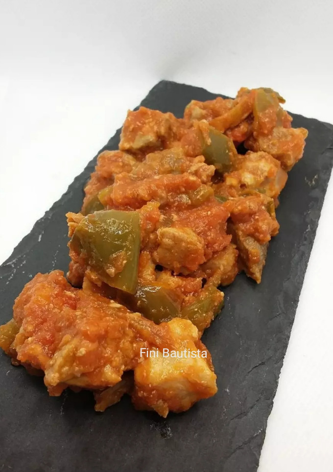 Una foto de Magra de cerdo con tomate