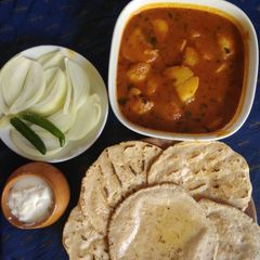 Garlic potato with jowar roti A picture of Garlic potato with jowar roti.