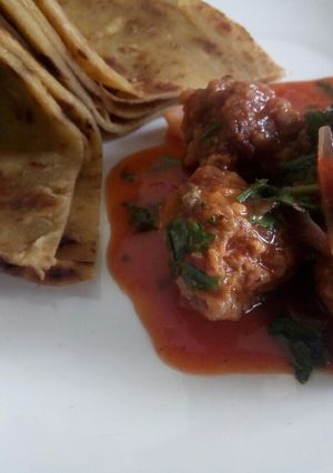 A picture of Fish balls in sauce.