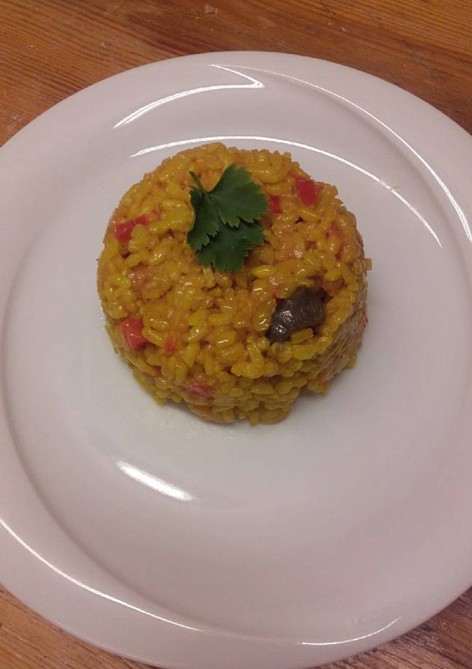 Una foto de Arroz con higaditos de pollo en olla rápida