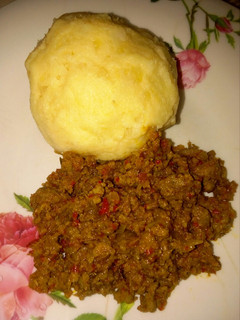 A picture of Mashed Potatoes and Minced Meat Sauce.