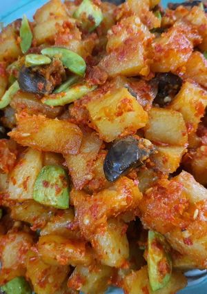 A picture of Sambal Potatoes with Balado (Stink Beans, Chicken Liver, and Gizzards).