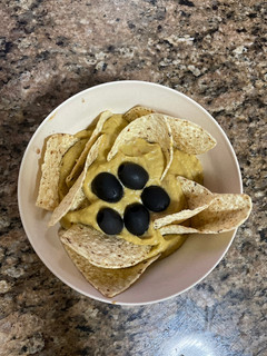Una foto de Guacamole con nachos