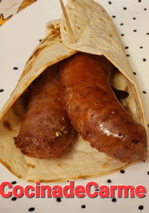 Una foto de Fajitas de butifarra y bacon con champiñones