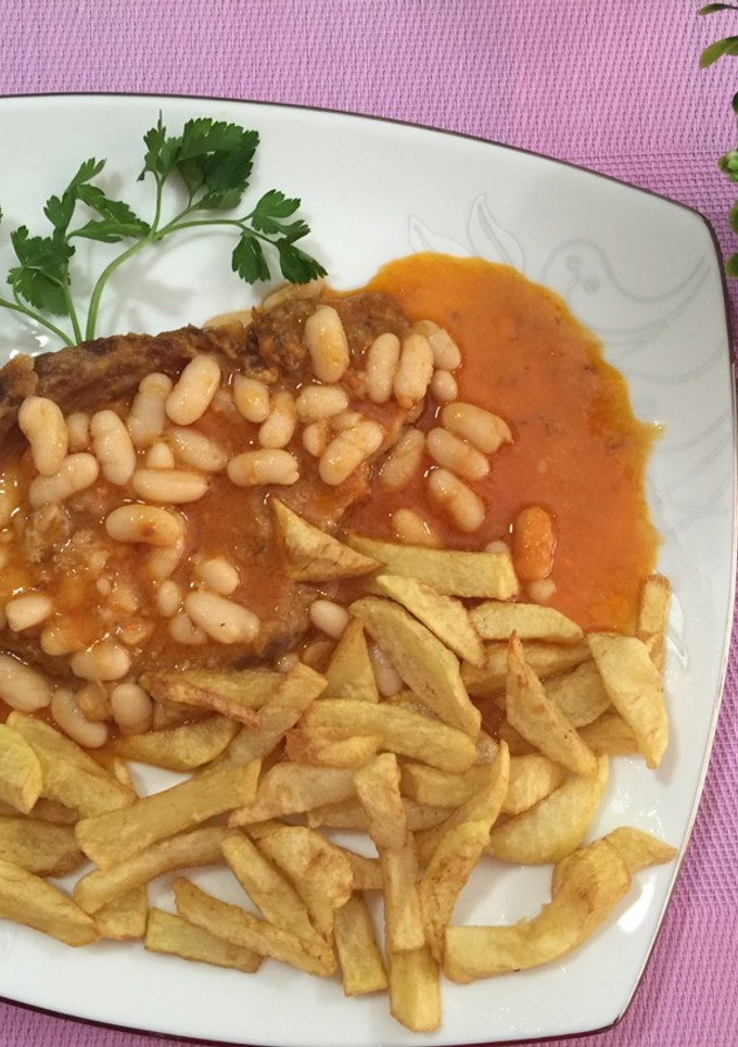 Una foto de Filetes de magra de cabeza a la sobrasada con alubias