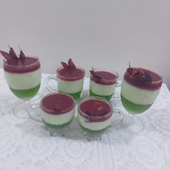 Pista custard pudding with banana jelly with palm sauce A picture of Pista custard pudding with banana jelly with palm sauce.