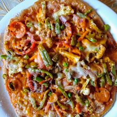 A picture of Colourful Veggie Pizza.