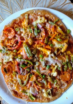A picture of Colourful Veggie Pizza.