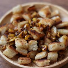 Homemade croutons and sweet corn toppings 🌽 A picture of Homemade croutons and sweet corn toppings 🌽.