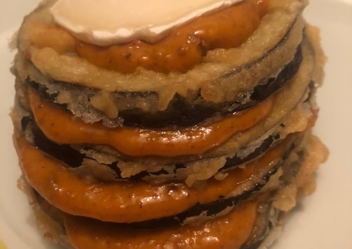 Timbal de berenjena con salsa romesco