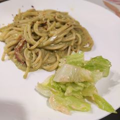 A picture of Pesto pasta.
