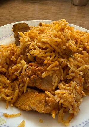 A picture of Chicken Biryani in cooker.