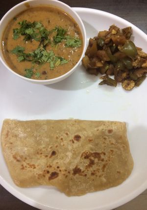 A picture of Dhal Makhani 30%healthier with corn aloo capsicum stir fry and roti.