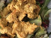 Una foto de pechuga de pollo con curry