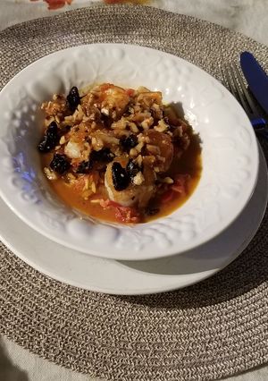 A picture of Steamed Orange Shrimp and Spanish Rice.