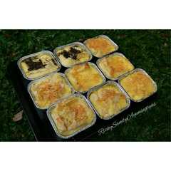 Bread Puding with topping cheese, chocolate and almound রেসিপির প্রধান ছবি