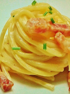 Una foto de Espaguetis con crema de emmental