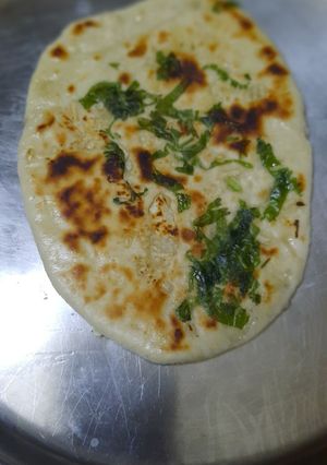 A picture of Garlic butter naan.