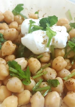 A picture of Chickpea yogurt spice salad with herbs and yogurt drink😊.
