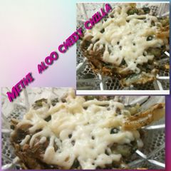 Methi aloo cheesy chilaa A picture of Methi aloo cheesy chilaa.