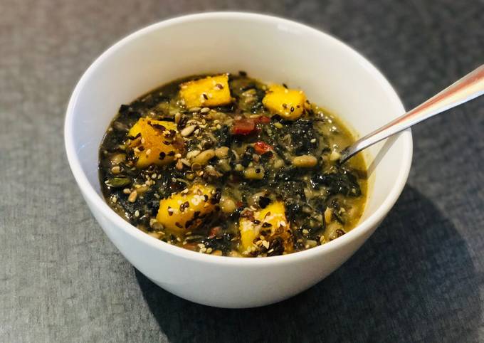 White Bean and Swiss Chard Egusi Soup with seed coated Polenta bites