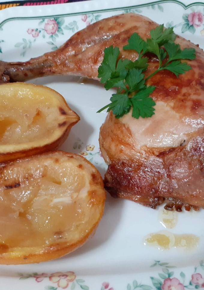 Una foto de Pollo al brandy y limones asados