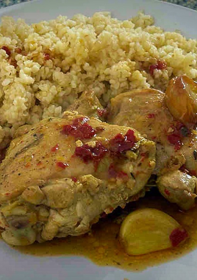 Una foto de Pollo al ajillo con ñoras
