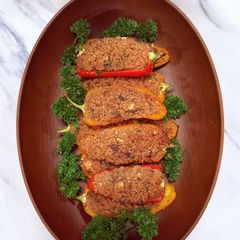 A picture of Stuffed baby peppers with date couscous and feta.