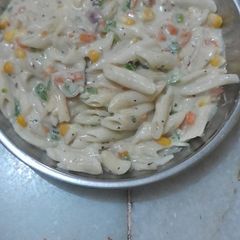 A picture of White Sauce Penne pasta.