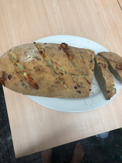 Una foto de 147. Pan de ajo y queso (guarnición)