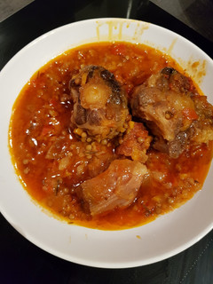 Una foto de Rabo de toro con lentejas