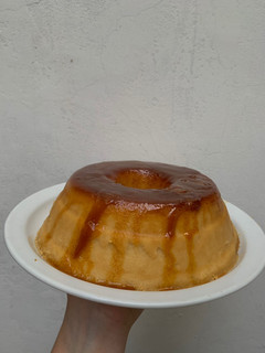 Una foto de Budín de pan súper rico🍮
