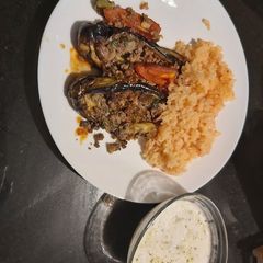 Tomatoe rice,eggplant with minced meat and cucumber mint yoghurt A picture of Tomatoe rice,eggplant with minced meat and cucumber mint yoghurt.