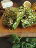 Spinach Focaccia with Spinach Pesto, Ricotta Salata, Marinated Zucchini, Tajín, and Preserved Lemon