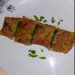 A picture of Veg omelette 🫑🧅🥚🫑.