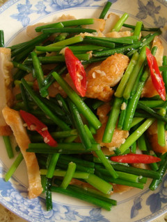 韭菜花炒甜不辣 的食譜成品照片