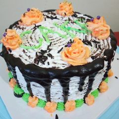 A picture of Chocolate Banana Cake With Drip Design.