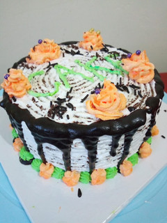 A picture of Chocolate Banana Cake With Drip Design.