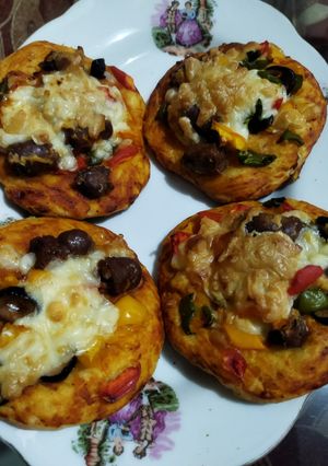 صورة لوصفة بيتزا بالسجق
