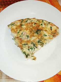 Una foto de Tortilla de Congrio y Camarones al perejil