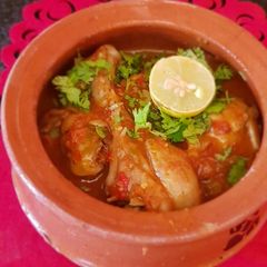 A picture of Chilli Chicken with tomato 😋.