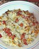 Nuggets de pollo con arroz a las tres delicias (salchichas, nuggets y tortilla)