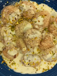 Foto di Gnocchi di zucca con gorgonzola, mascarpone e granella di pistacchi