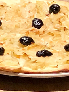 Une photo de Tarte aux oignons et olive