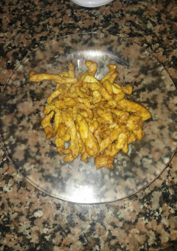 Una foto de Tiras de pechuga de pollo con especias y miel