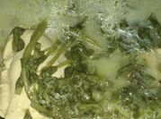 Una foto de verdolagas en salsa verde con carne