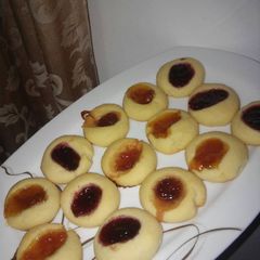A picture of Jam Thumbprint cookies.