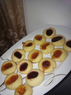 A picture of Jam Thumbprint cookies.