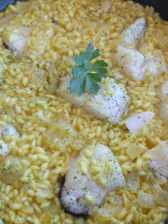 Una foto de Risotto con tacos de bacalao