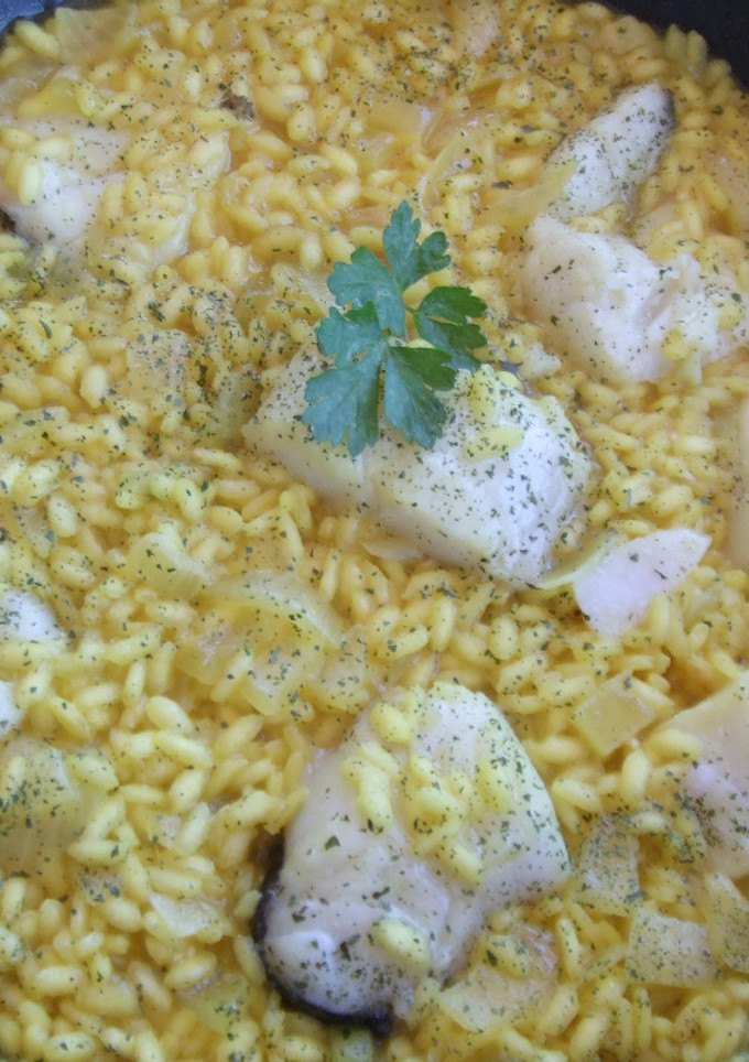 Una foto de Risotto con tacos de bacalao